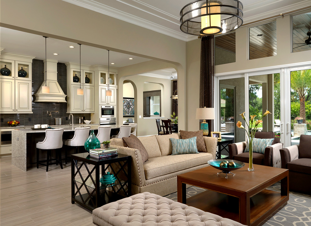 This is an example of a transitional formal open concept living room in Orlando with beige walls, porcelain floors and beige floor.