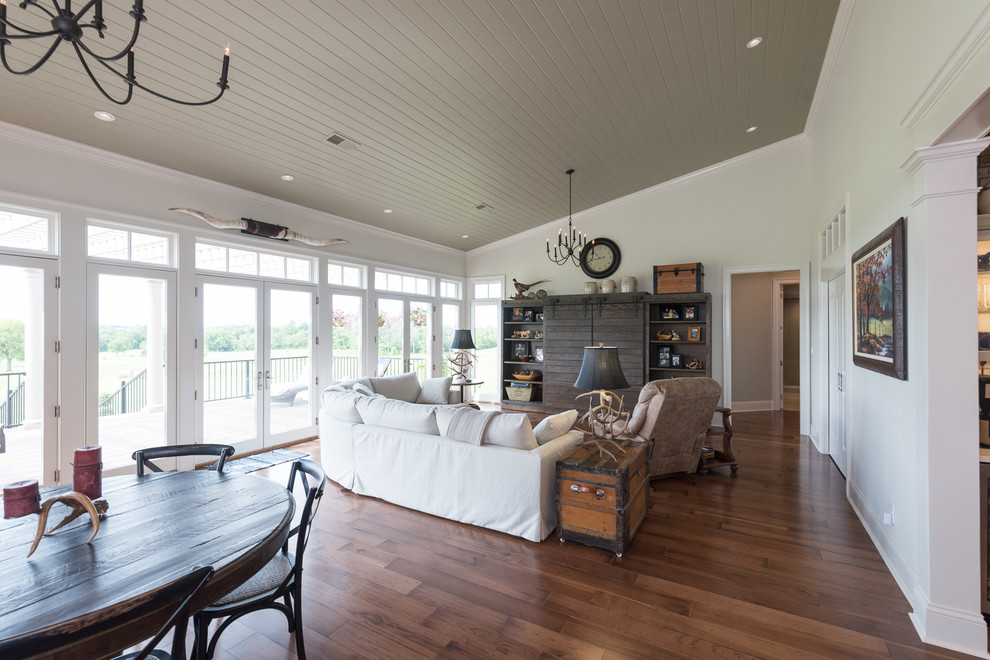 Example of a large transitional home design design