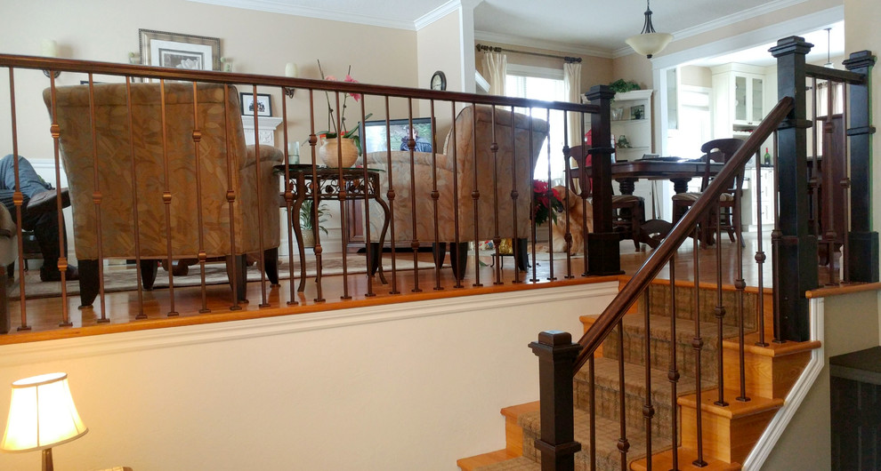Inspiration for a mid-sized transitional wooden straight wood railing staircase remodel with wooden risers