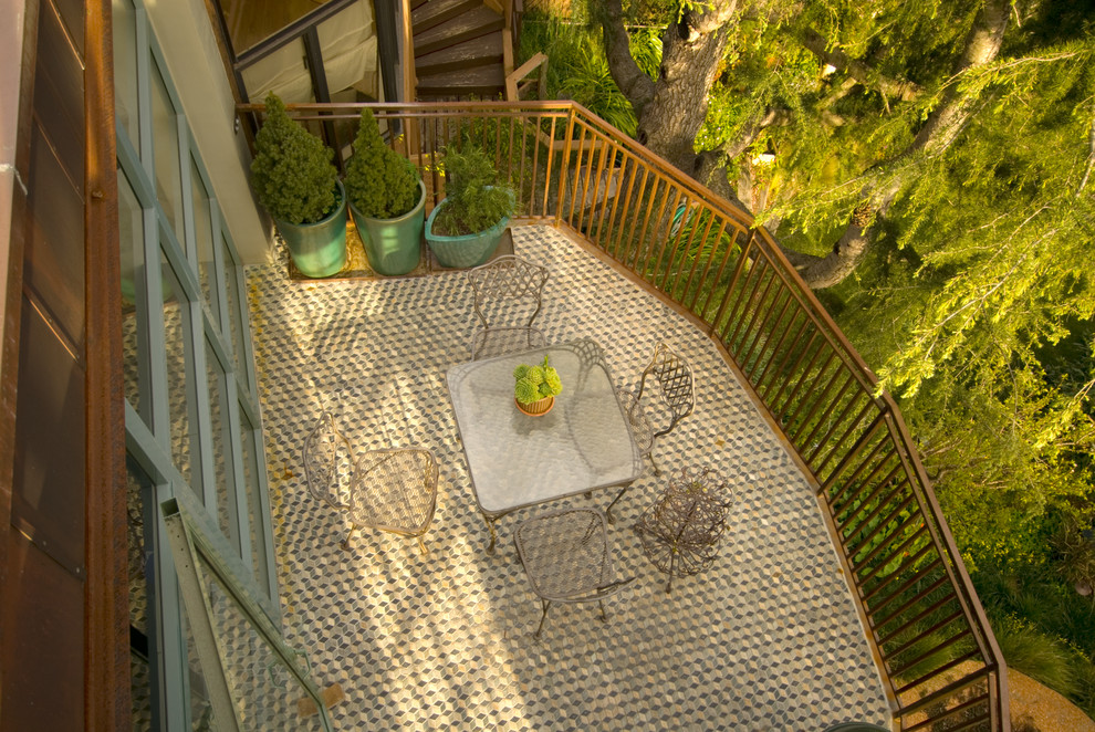 This is an example of a mid-sized contemporary backyard deck in San Francisco.