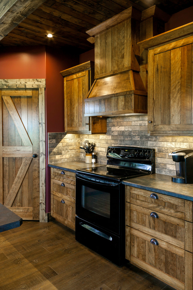 Inspiration for a mid-sized rustic eat-in kitchen remodel in Edmonton with a double-bowl sink, shaker cabinets, medium tone wood cabinets, laminate countertops, black appliances and an island