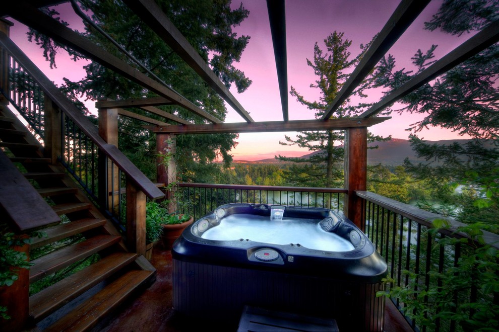Hot tub - rustic hot tub idea in Calgary