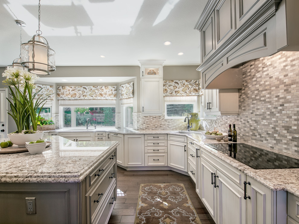 Eat-in kitchen - large transitional u-shaped dark wood floor eat-in kitchen idea in Denver with beaded inset cabinets, distressed cabinets, granite countertops, metallic backsplash, metal backsplash, stainless steel appliances and an island