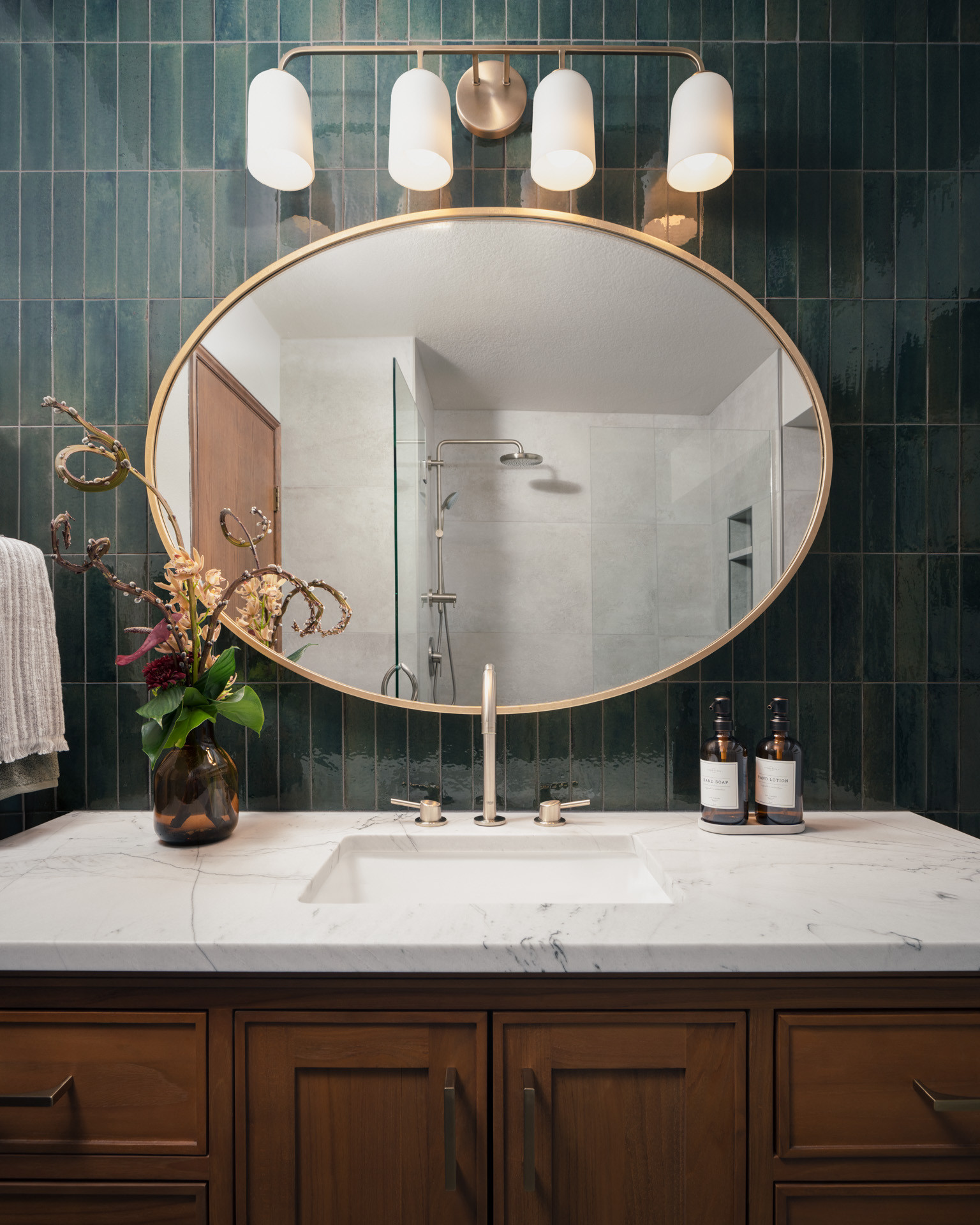 Tiger Mountain Guest Bath Reflective Green Tile Backsplash Paired with a Quartzi