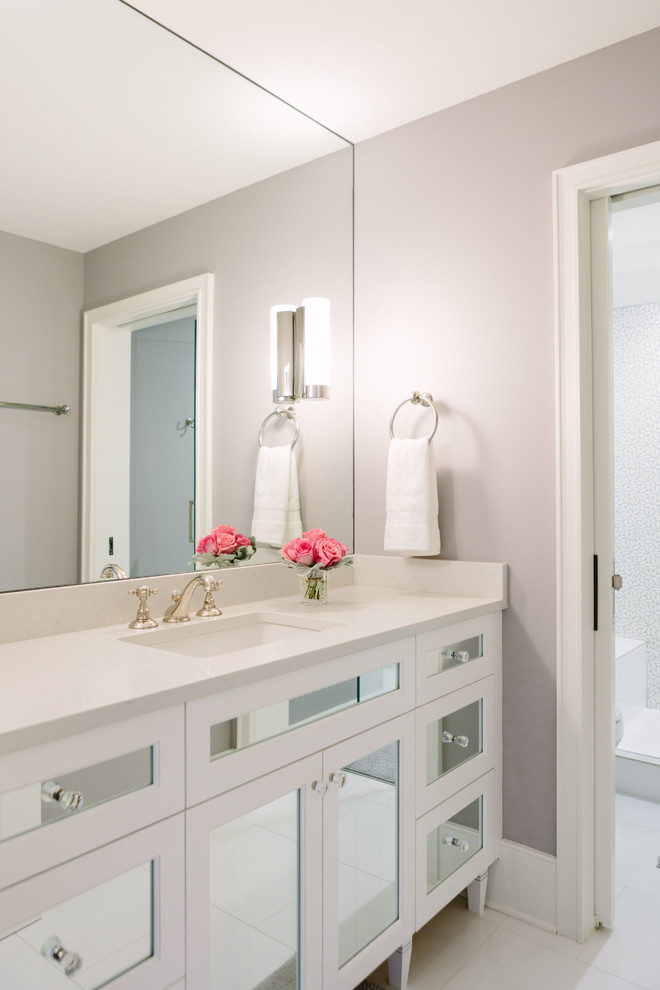 Inspiration for a mid-sized transitional 3/4 wet room bathroom in Chicago with beaded inset cabinets, medium wood cabinets, a two-piece toilet, multi-coloured walls, porcelain floors, an undermount sink, tile benchtops, white floor, a hinged shower door and multi-coloured benchtops.