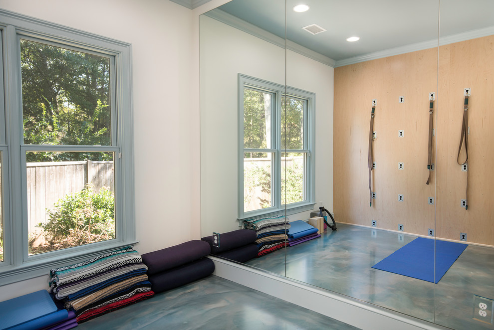 Design ideas for a small beach style home gym in Atlanta with concrete floors and blue floor.