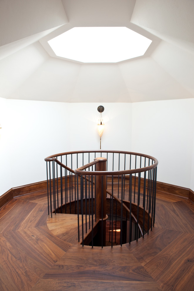 Inspiration for a rustic spiral staircase remodel