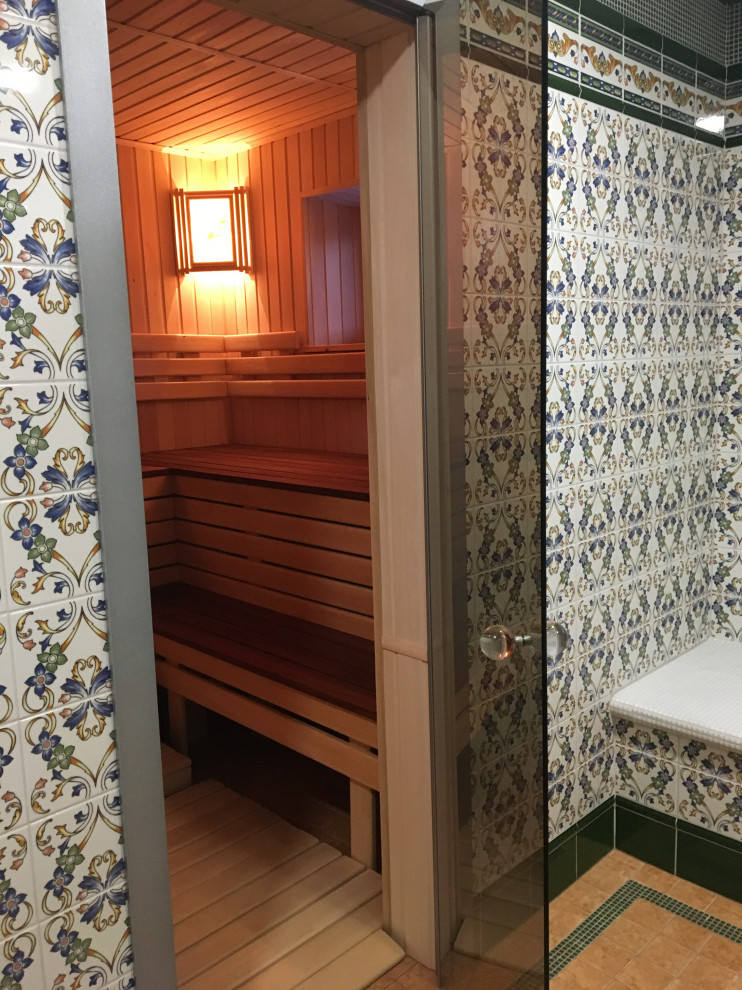 Design ideas for a mid-sized asian bathroom in Other with multi-coloured tile, ceramic floors, with a sauna and brown floor.
