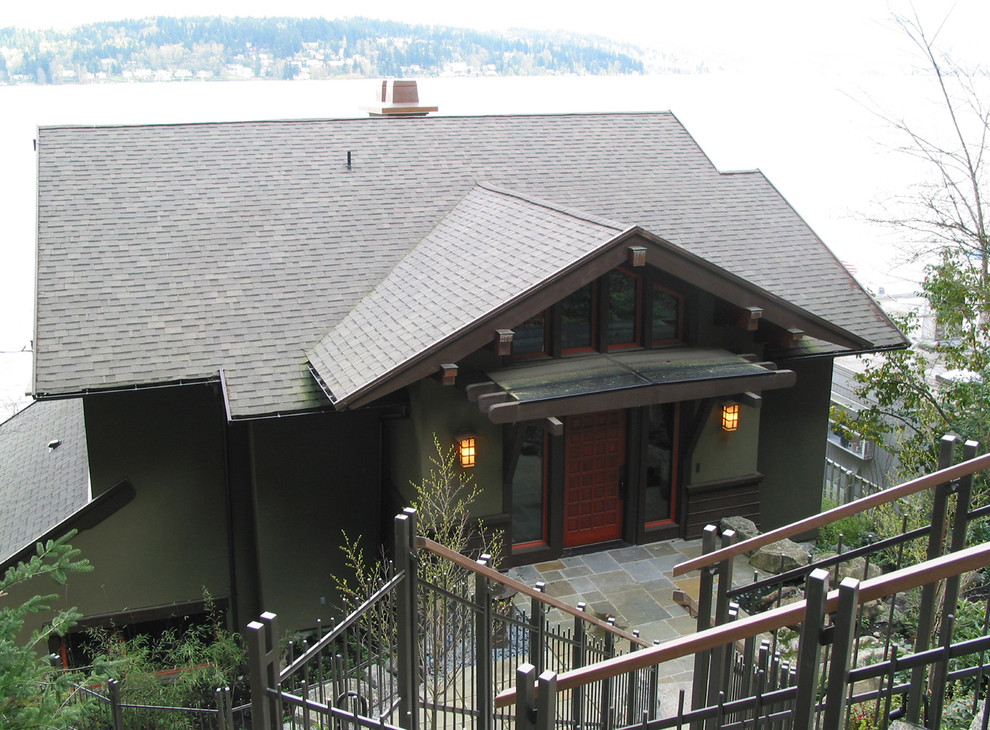 Inspiration for a mid-sized craftsman three-story stucco exterior home remodel in Seattle