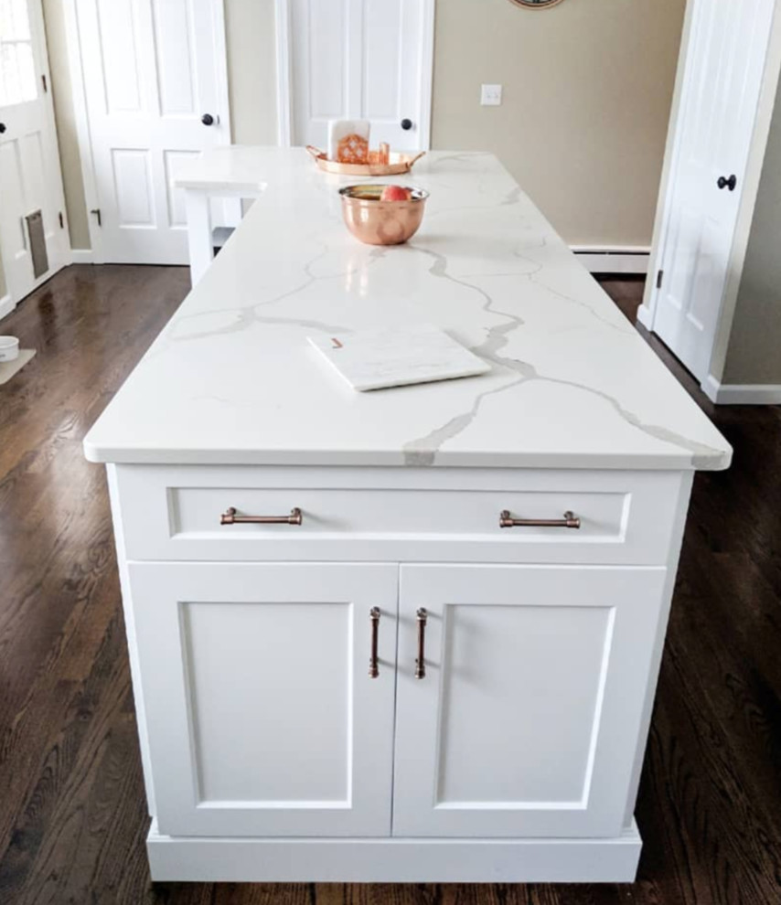 Inspiration for a mid-sized transitional l-shaped enclosed kitchen remodel with beaded inset cabinets, white cabinets and an island