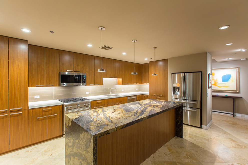 Example of a mid-sized transitional l-shaped travertine floor and beige floor enclosed kitchen design in Phoenix with an undermount sink, flat-panel cabinets, medium tone wood cabinets, onyx countertops, beige backsplash, porcelain backsplash, stainless steel appliances and an island