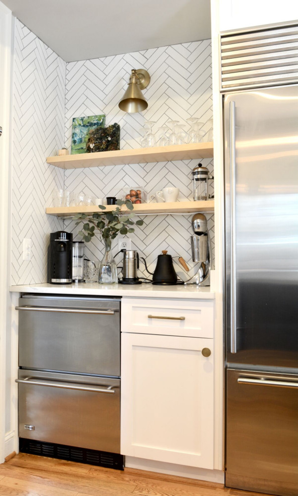 Kitchen - transitional kitchen idea with marble countertops and ceramic backsplash