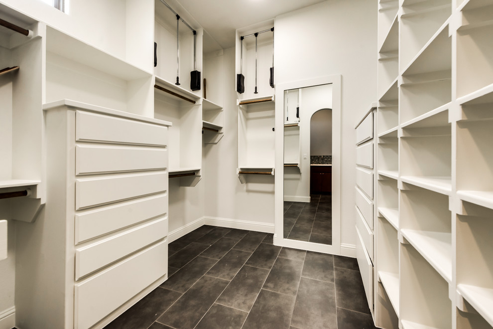 This is an example of a transitional storage and wardrobe in Dallas.
