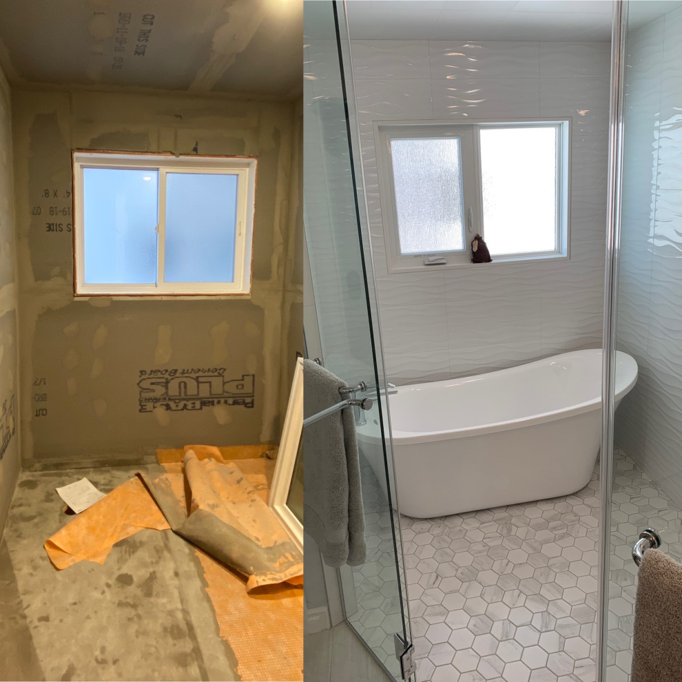 Idéer för att renovera ett mellanstort funkis vit vitt en-suite badrum, med skåp i shakerstil, vita skåp, ett fristående badkar, en kantlös dusch, en toalettstol med separat cisternkåpa, vit kakel, keramikplattor, grå väggar, klinkergolv i keramik, ett undermonterad handfat, granitbänkskiva, grått golv och dusch med gångjärnsdörr