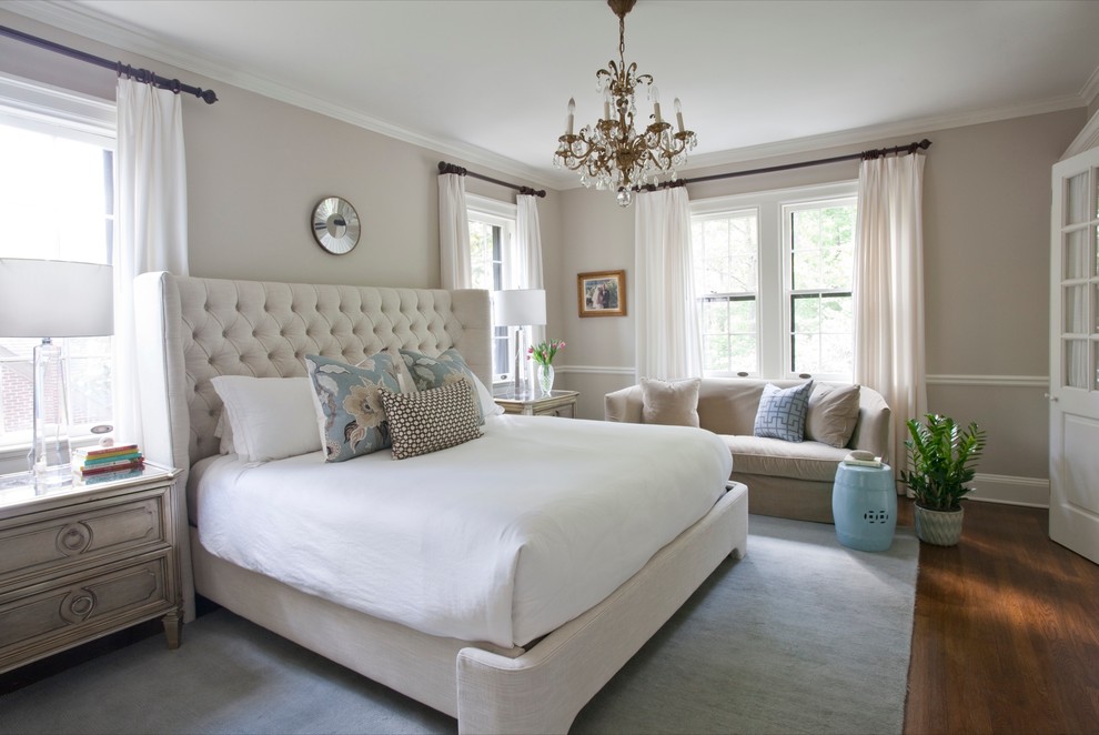Example of a mid-sized classic master medium tone wood floor bedroom design in Atlanta with gray walls and no fireplace