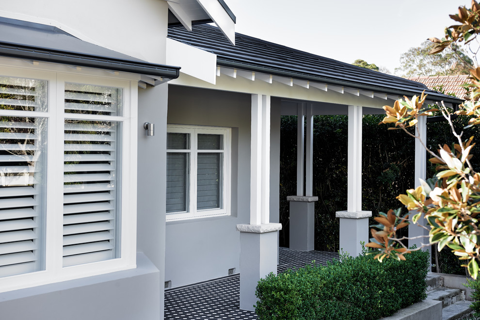 Photo of a transitional two-storey grey exterior in Sydney.