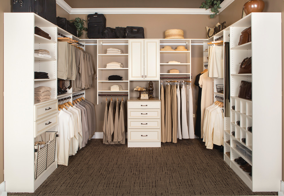 Photo of a large contemporary gender-neutral dressing room in San Diego with raised-panel cabinets, white cabinets and carpet.