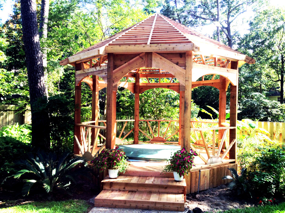 Design ideas for a small backyard patio in Houston with a gazebo/cabana.