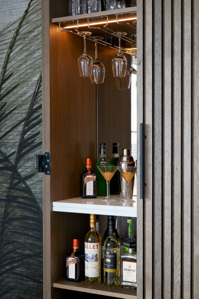Inspiration for a contemporary home bar in Surrey.