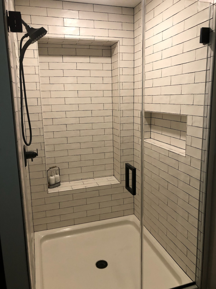 Inspiration for a mid-sized country master bathroom in Philadelphia with an alcove shower, white tile, subway tile, white floor and a hinged shower door.