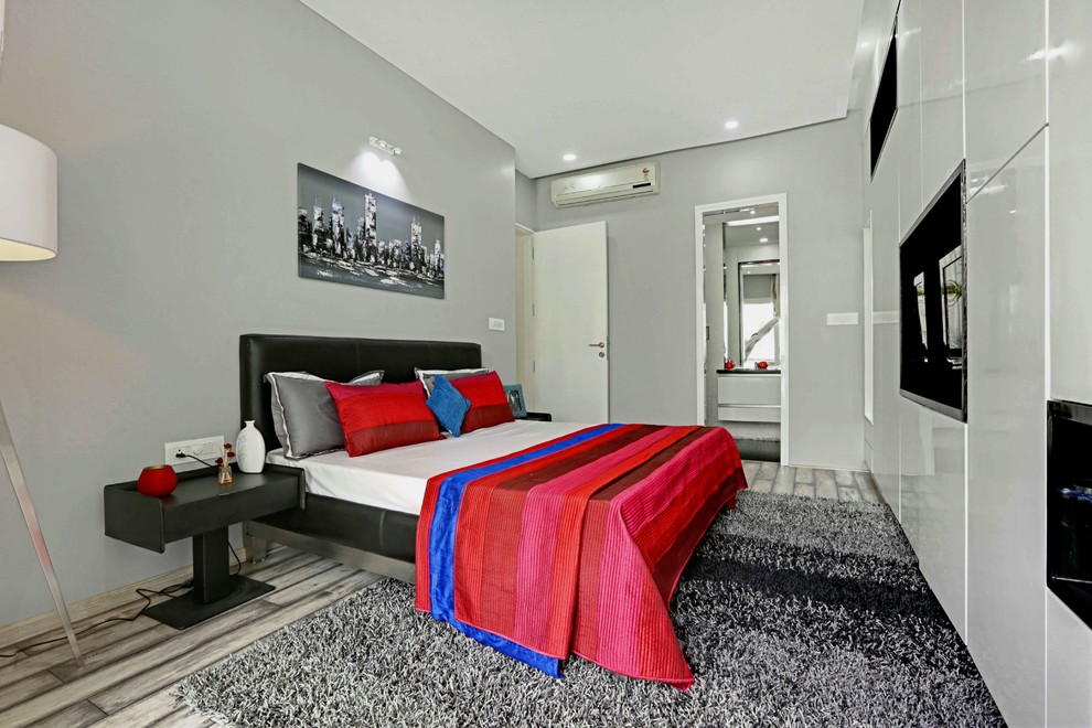 This is an example of a contemporary bedroom in Bengaluru.