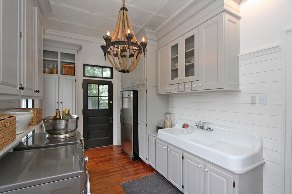 Design ideas for a transitional laundry room in Charleston.