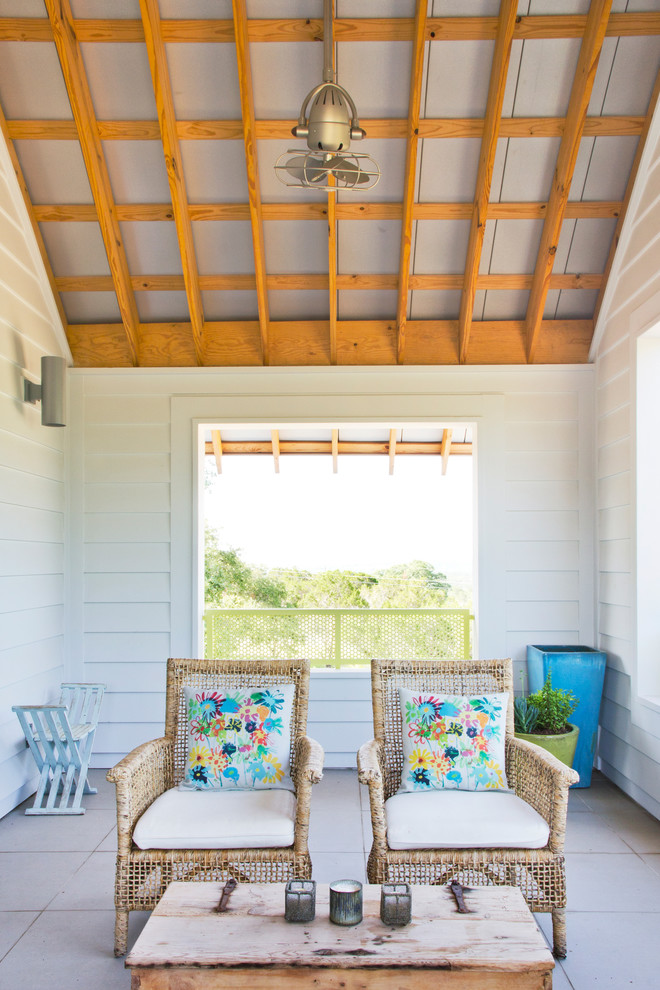 Design ideas for a country verandah in Austin with tile and a roof extension.