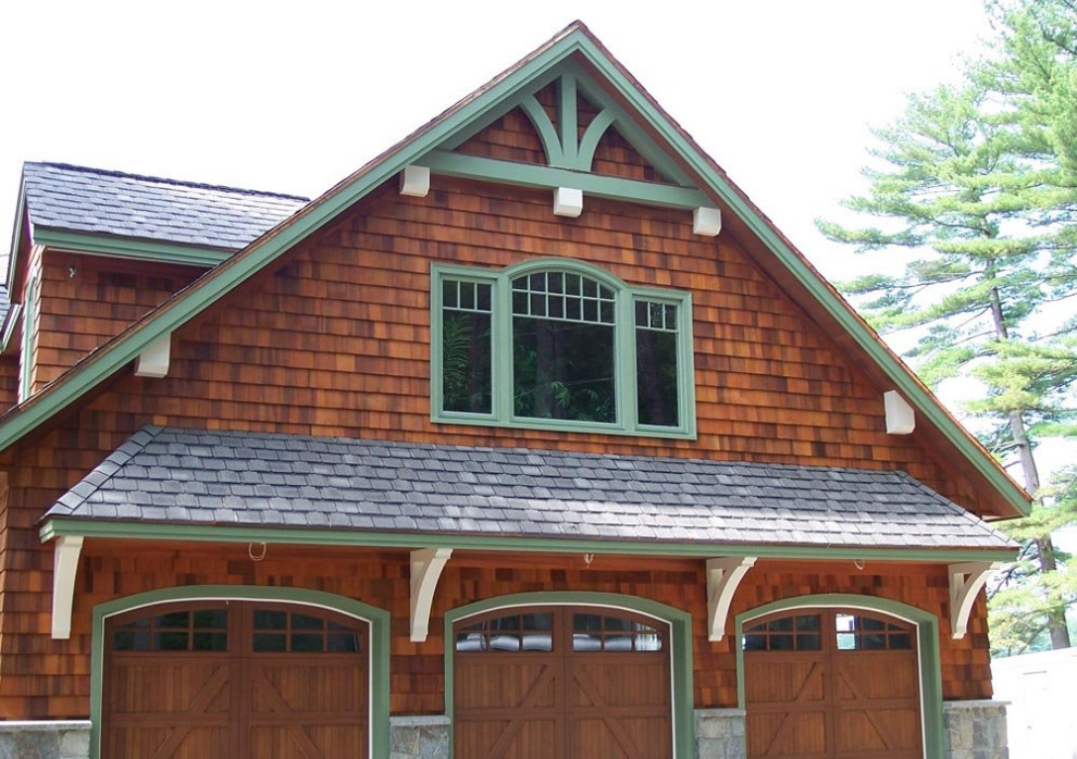 Inspiration for a large arts and crafts two-storey brown exterior in Boston with wood siding.
