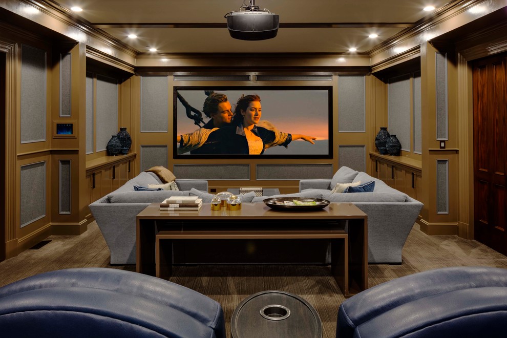 Traditional enclosed home theatre in Boston with multi-coloured walls, carpet, a projector screen and brown floor.