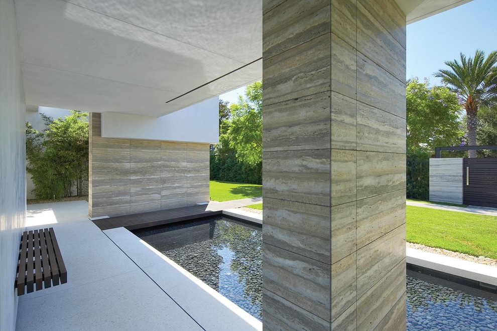 Inspiration for a contemporary backyard rectangular pool in Other.