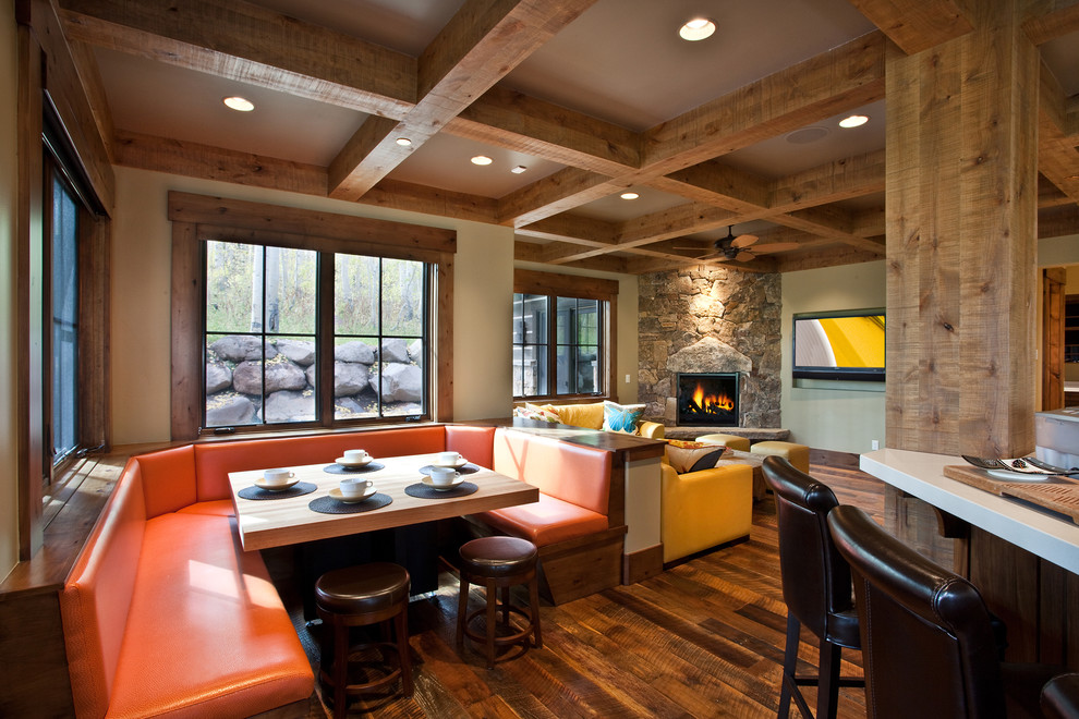 Design ideas for a country eat-in kitchen in Salt Lake City with medium wood cabinets.