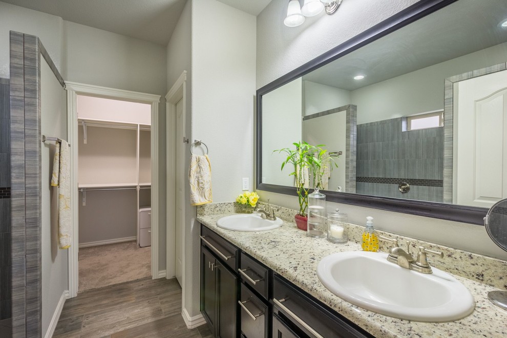 Example of a transitional home design design in Austin