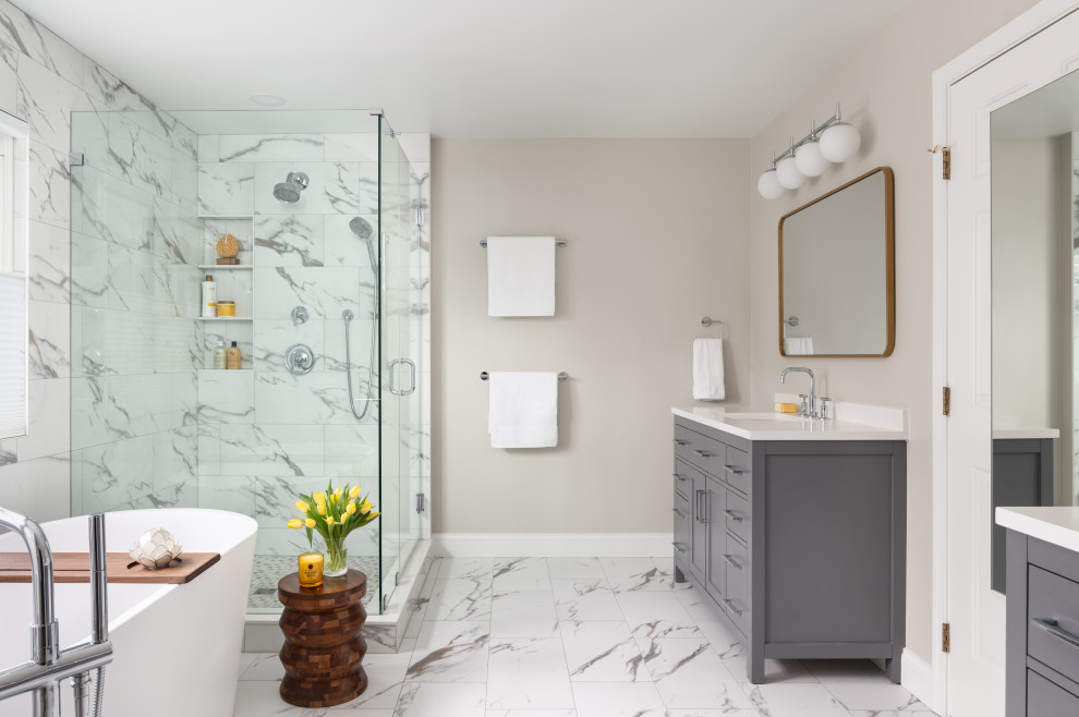 Example of a large trendy master white tile and porcelain tile porcelain tile, white floor and double-sink bathroom design in DC Metro with shaker cabinets, gray cabinets, a two-piece toilet, gray walls, an undermount sink, quartz countertops, a hinged shower door, white countertops, a niche and a freestanding vanity