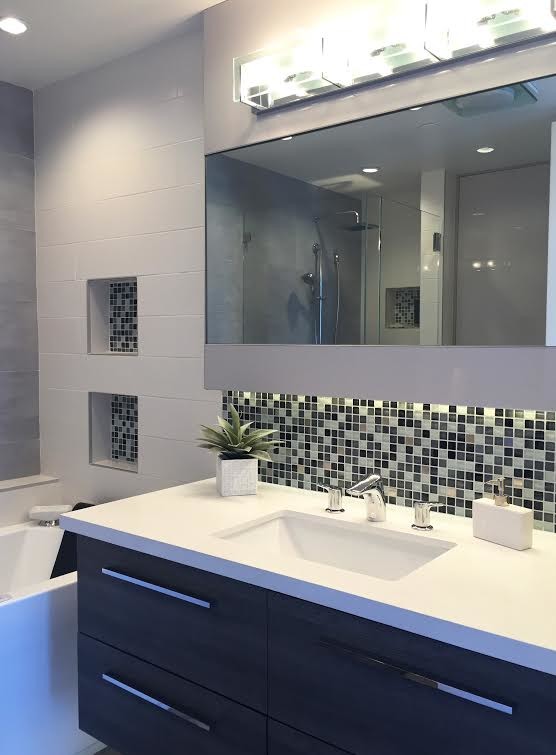 Design ideas for a contemporary bathroom in Orange County with an undermount sink, dark wood cabinets, a corner tub, a corner shower, green tile, mosaic tile and purple walls.