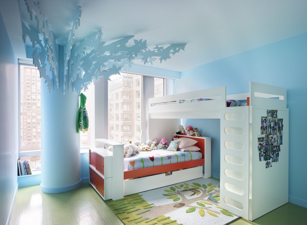 Design ideas for an eclectic gender-neutral kids' bedroom for kids 4-10 years old in New York with blue walls and green floor.