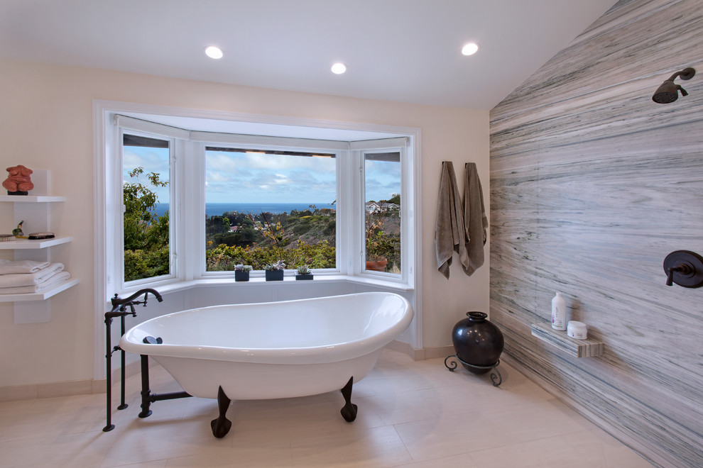 Large arts and crafts master bathroom in Los Angeles with an undermount sink, shaker cabinets, white cabinets, marble benchtops, a claw-foot tub, an open shower, a two-piece toilet, stone tile, white walls, marble floors and beige floor.