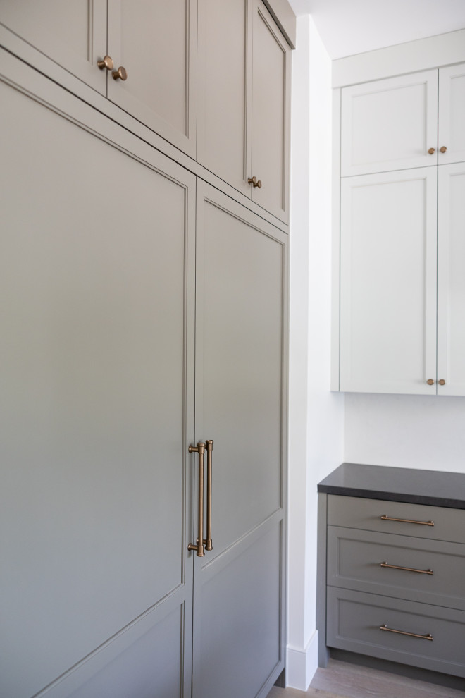 Open concept kitchen - large transitional galley open concept kitchen idea in Phoenix with an integrated sink, recessed-panel cabinets, gray cabinets, marble countertops, white backsplash, marble backsplash, paneled appliances, an island and white countertops