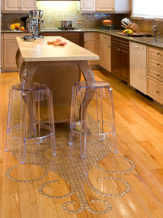 Inspiration for a mid-sized eclectic u-shaped medium tone wood floor eat-in kitchen remodel in Calgary with a double-bowl sink, raised-panel cabinets, distressed cabinets, quartz countertops, multicolored backsplash and stainless steel appliances