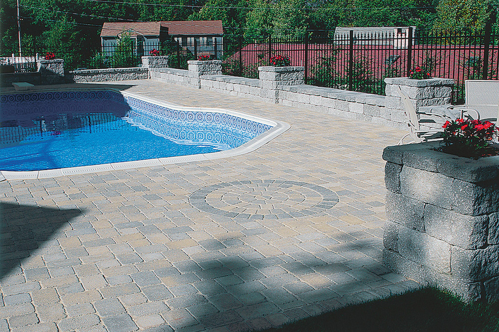 Inspiration for a small transitional backyard concrete paver and custom-shaped pool remodel in Boston