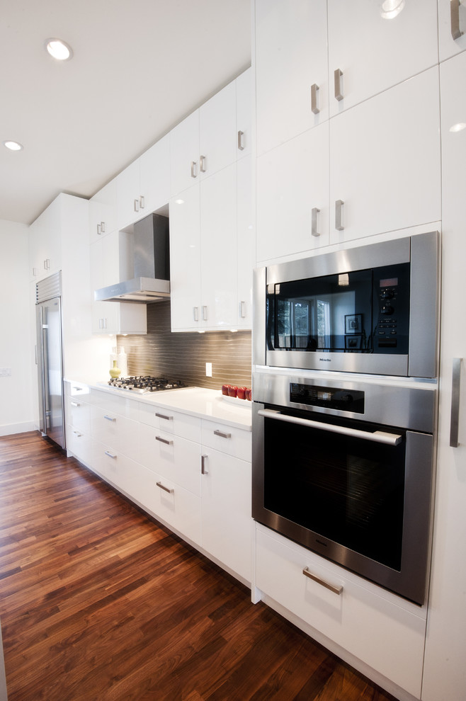 Photo of a contemporary kitchen in Calgary with stainless steel appliances.