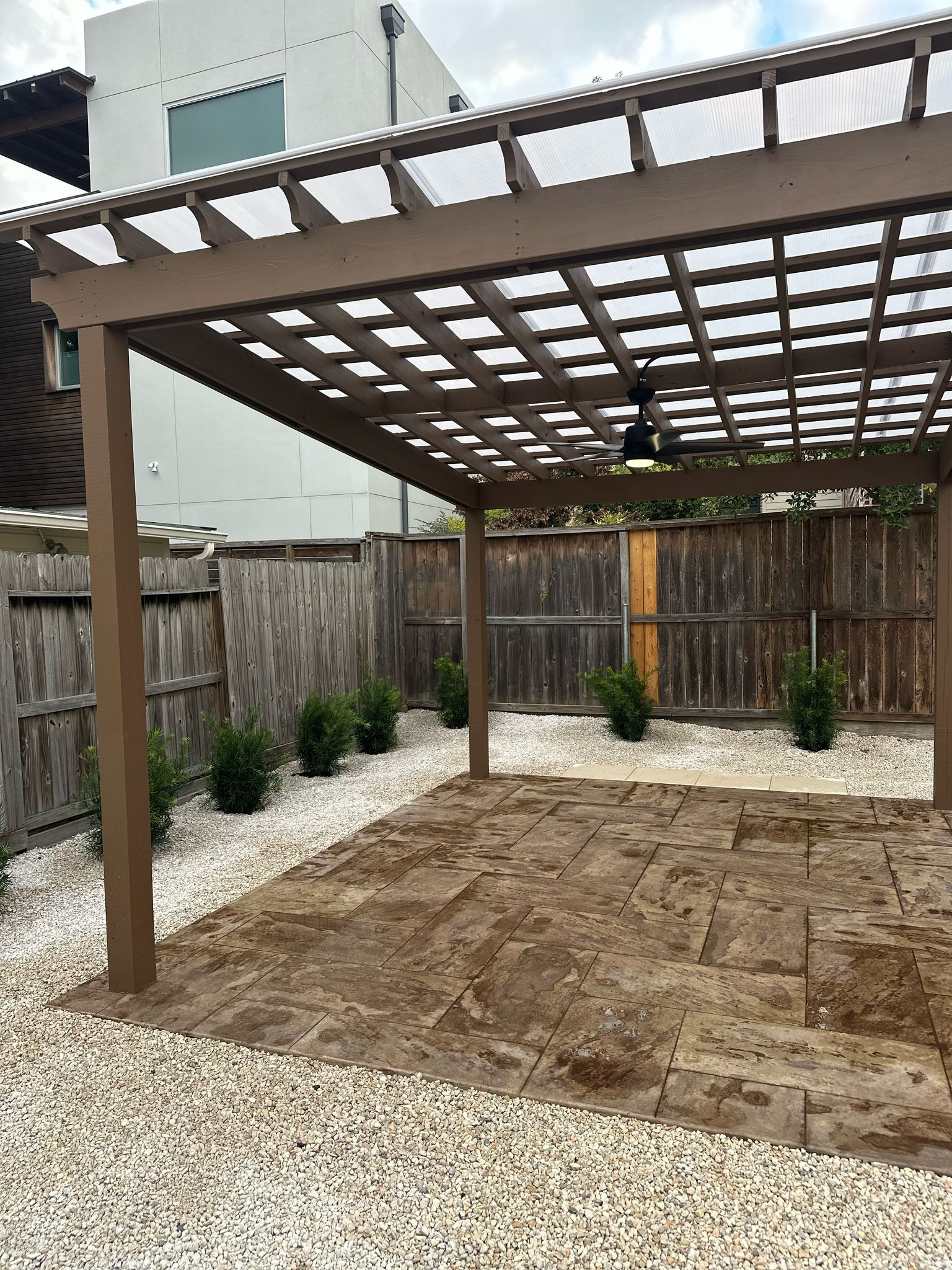 Beautiful stamped concrete patio with Pergola Cover on Haddon st!