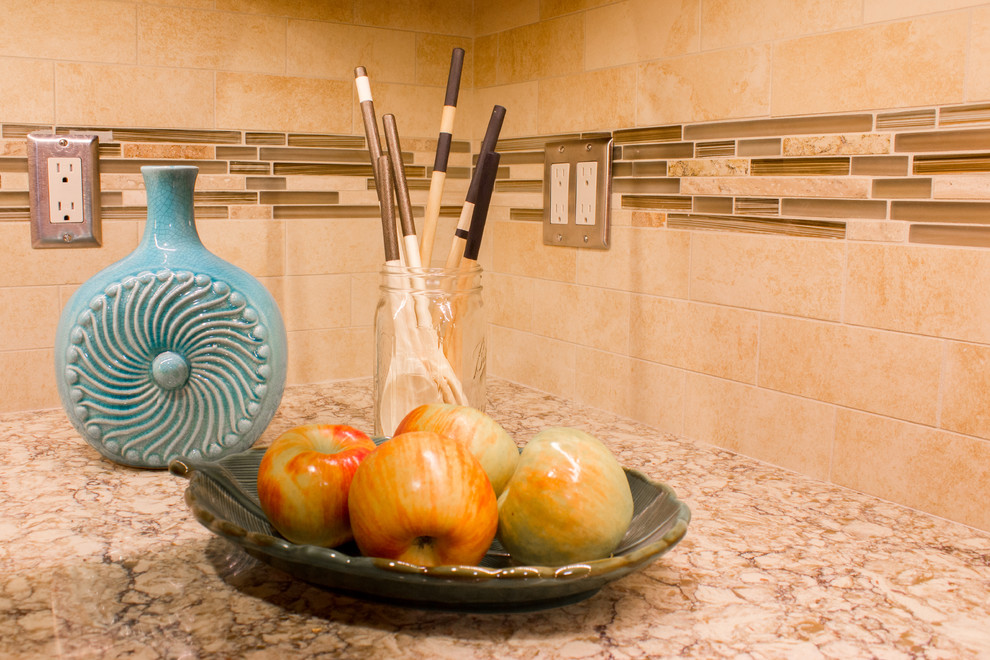 Enclosed kitchen - modern l-shaped enclosed kitchen idea with beige backsplash, granite countertops and subway tile backsplash