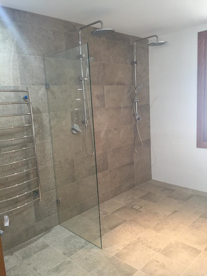 This is an example of a large contemporary bathroom in Newcastle - Maitland with an open shower, cement tile, white walls, cement tiles and an open shower.