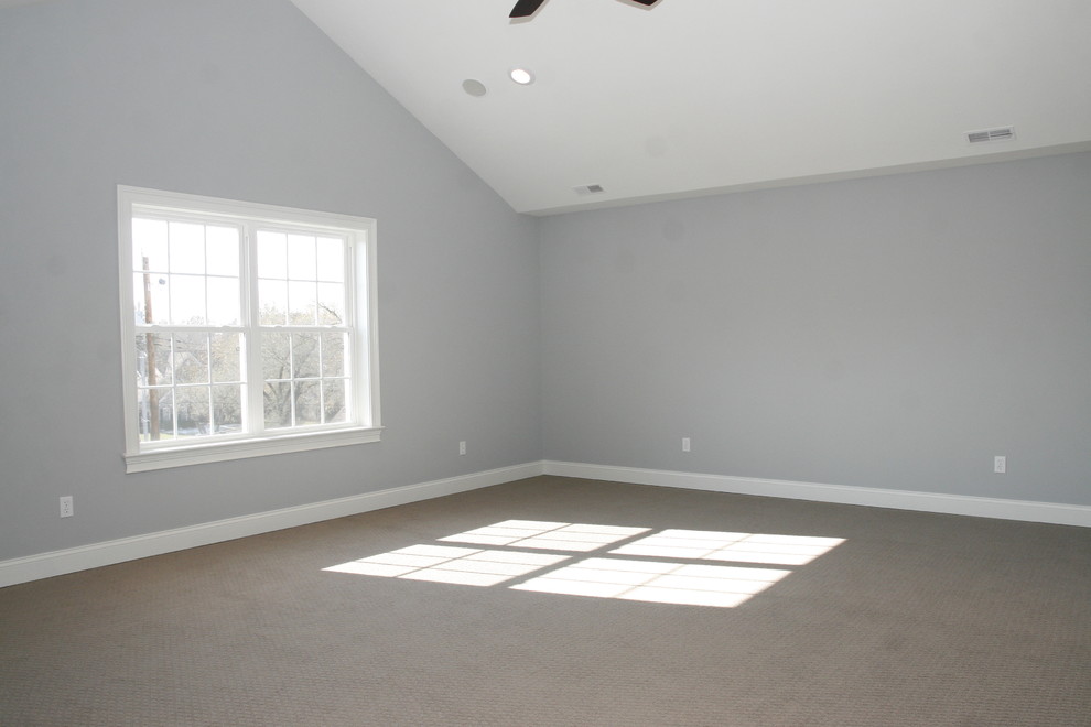 Design ideas for a large transitional master bedroom in St Louis with grey walls, carpet and no fireplace.