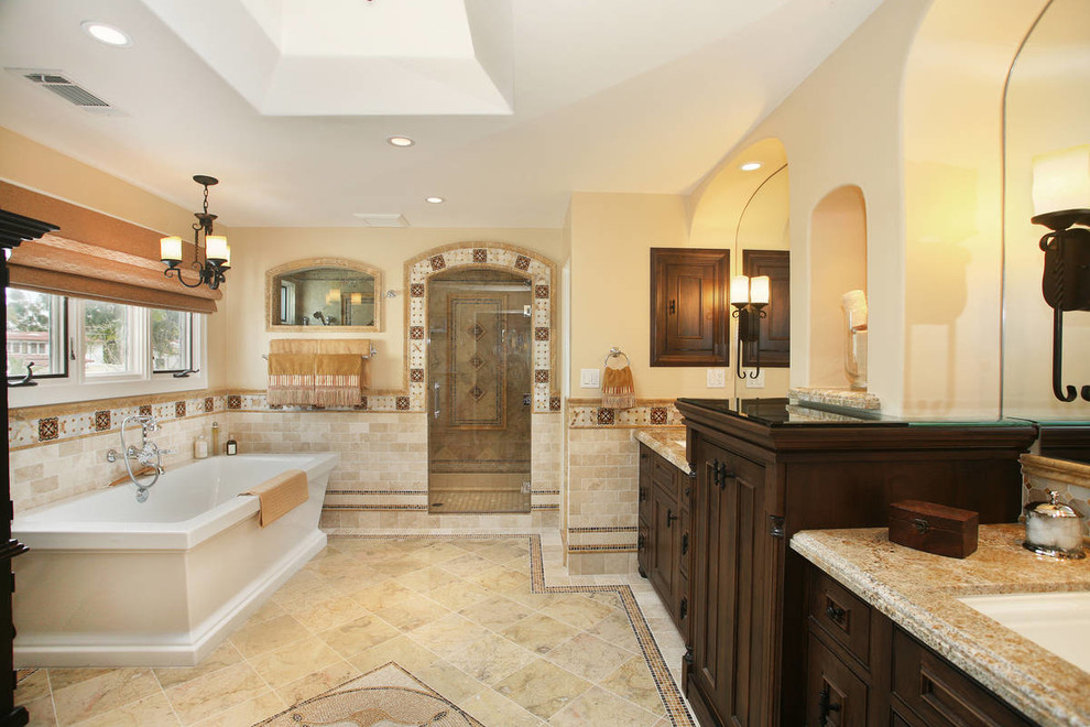 Inspiration for a mediterranean bathroom in San Diego with a freestanding tub.