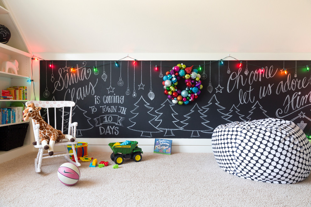 Inspiration for a mid-sized transitional gender-neutral kids' playroom for kids 4-10 years old in Little Rock with carpet and multi-coloured walls.
