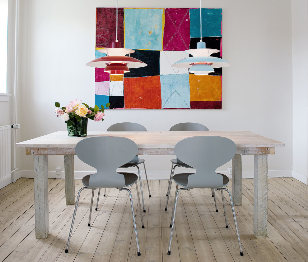 Inspiration for a contemporary dining room in Sydney with white walls.