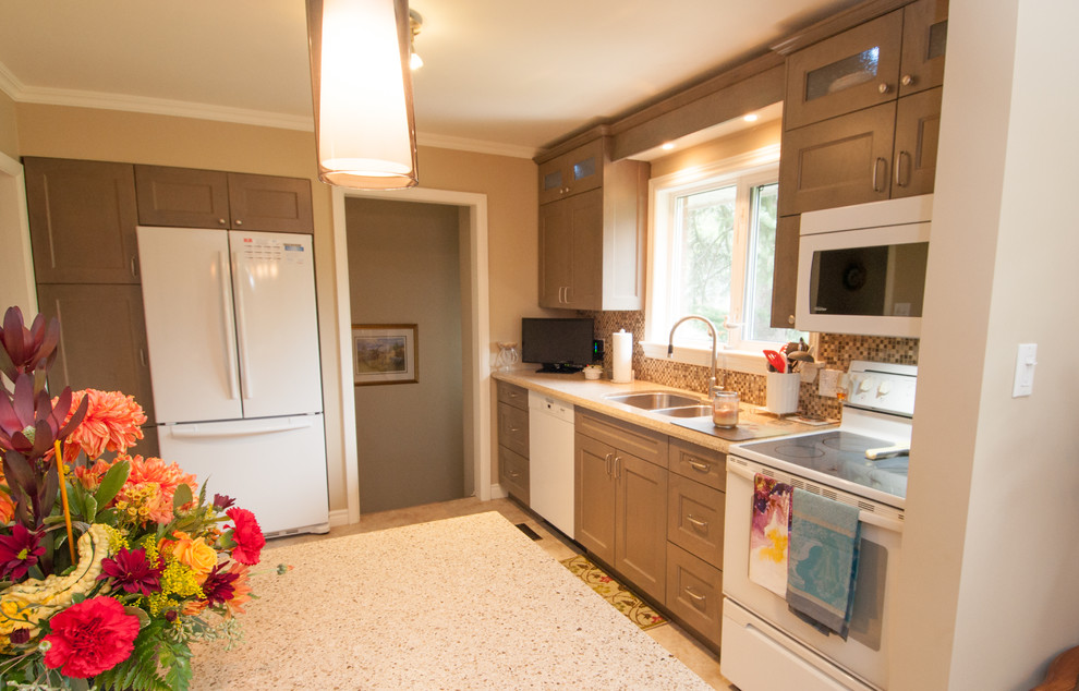 Example of a mid-sized transitional u-shaped vinyl floor and beige floor eat-in kitchen design in Toronto with shaker cabinets, distressed cabinets, quartzite countertops, multicolored backsplash, a peninsula, a double-bowl sink, mosaic tile backsplash and white appliances