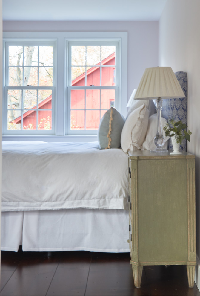 Inspiration for a large farmhouse master dark wood floor and brown floor bedroom remodel in New York with pink walls and no fireplace