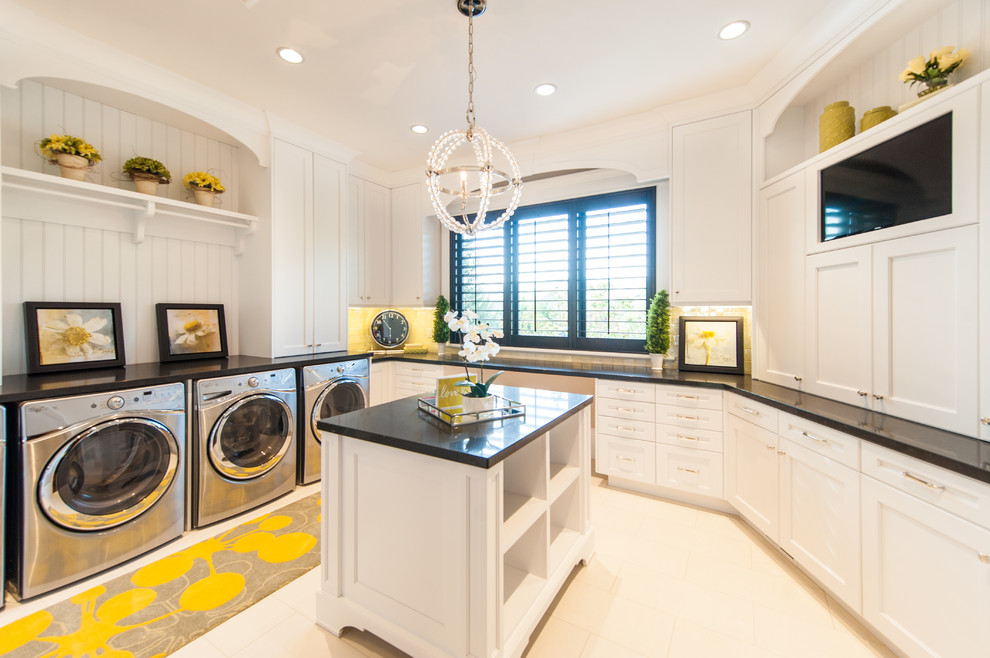 Large transitional u-shaped utility room in Salt Lake City with white walls, an undermount sink, shaker cabinets, white cabinets, granite benchtops, a side-by-side washer and dryer and white floor.